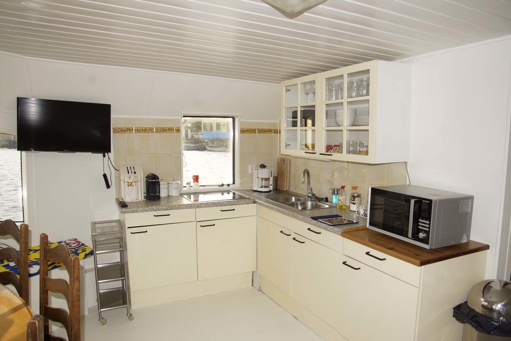Hotel en barco The Island Houseboat